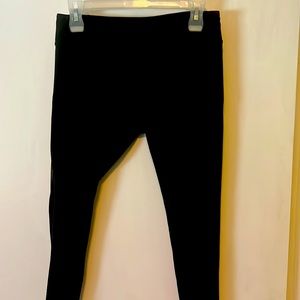 KiraGrace black leggings size medium. Never worn with mesh siding from hip down.